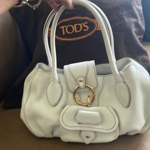 A like new Tod’s shoulder bag. 3 generous areas inside